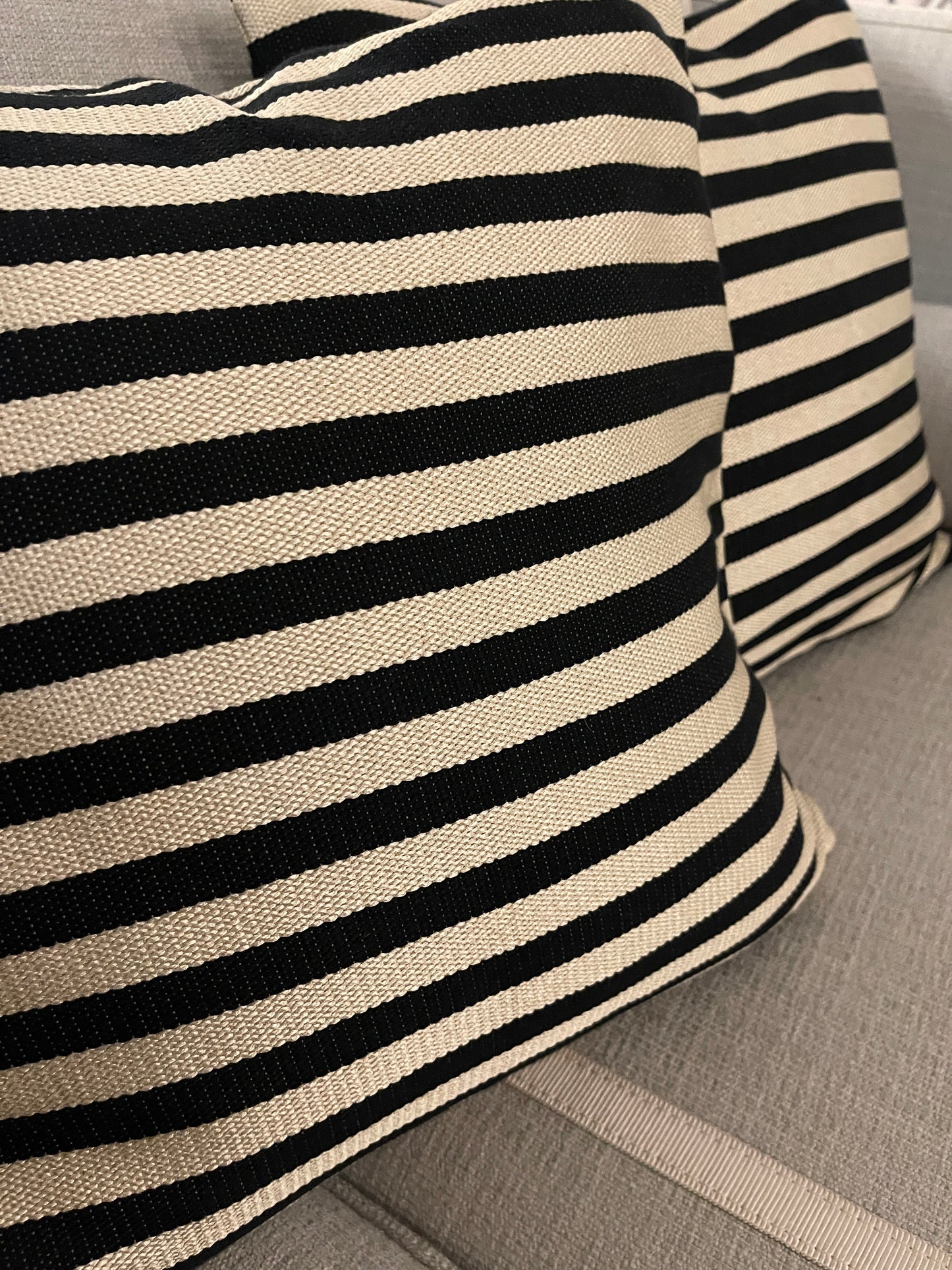 Striped cushions in Schumacher stripe