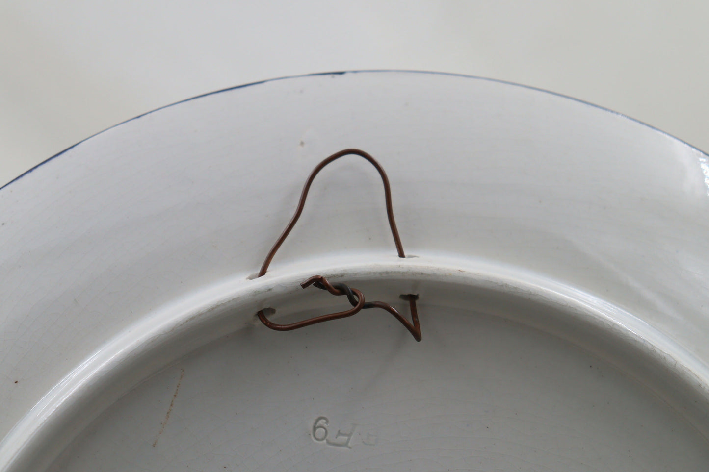 Hand painted wall charger by Gien of France
