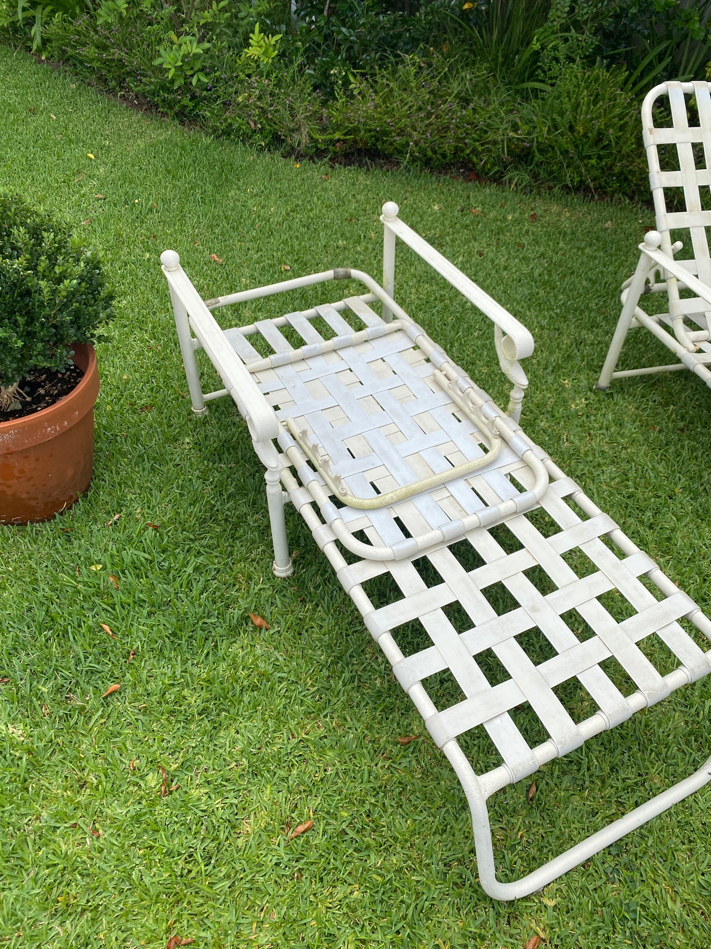 Pair vintage metal pool loungers