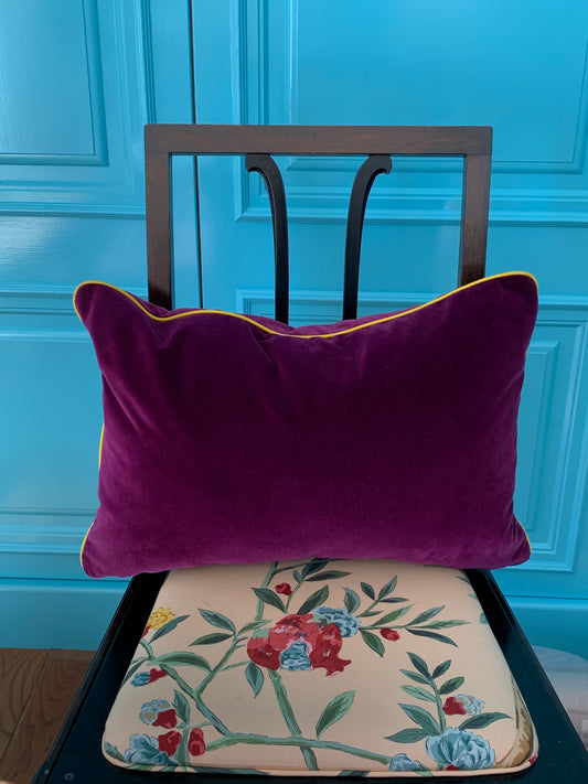 Deep purple velvet lumbar cushion with yellow piping