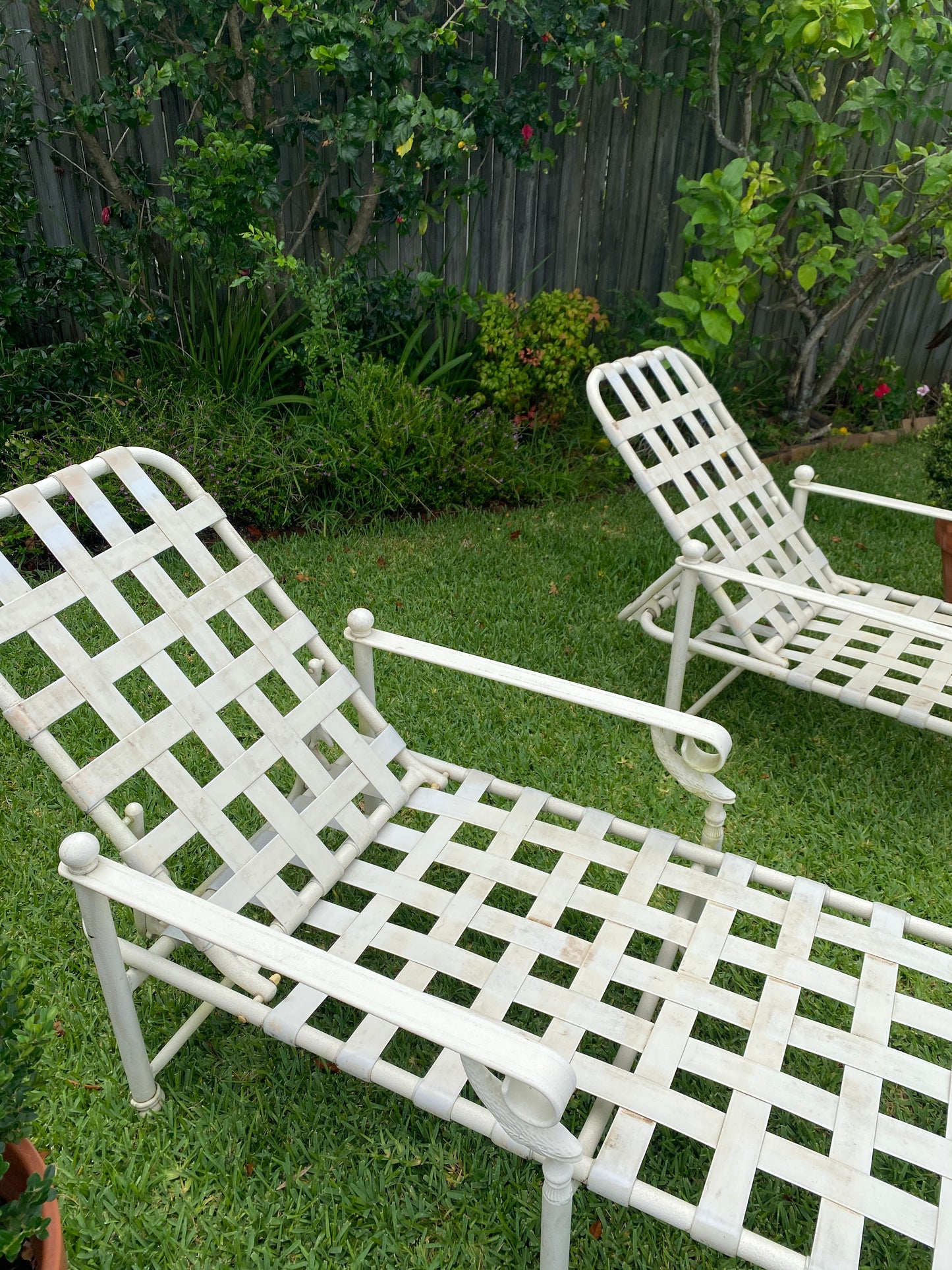 Pair vintage metal pool loungers