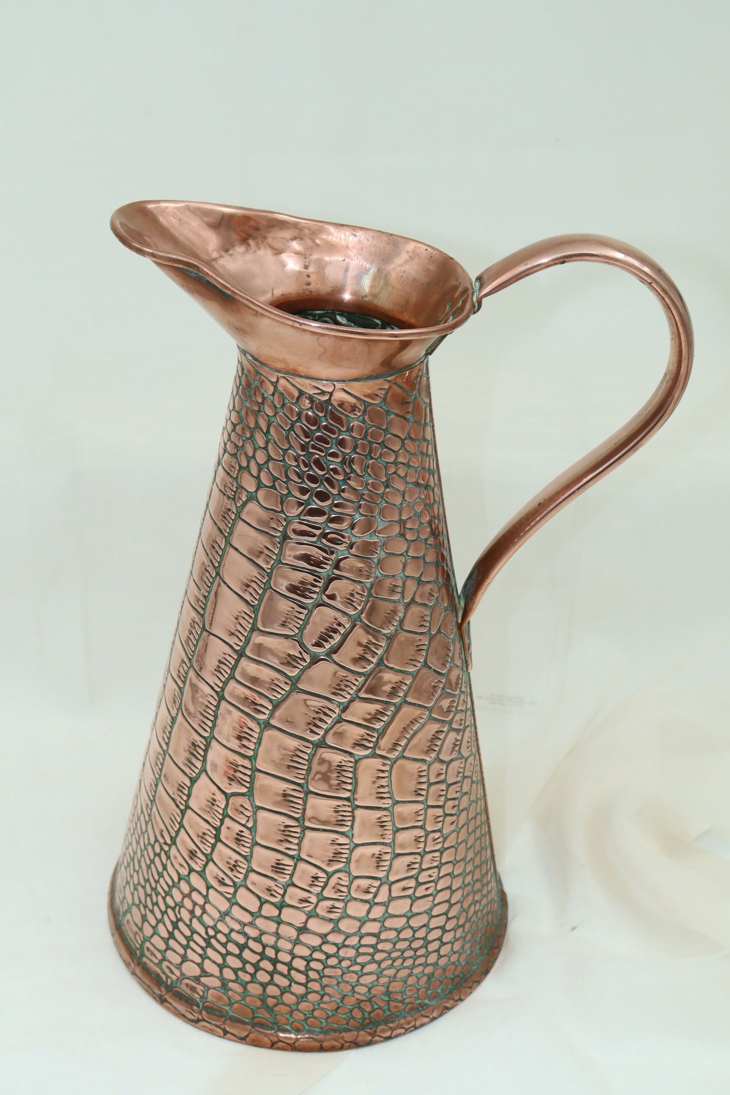 Copper crocodile skin jug by Sankey and Sons