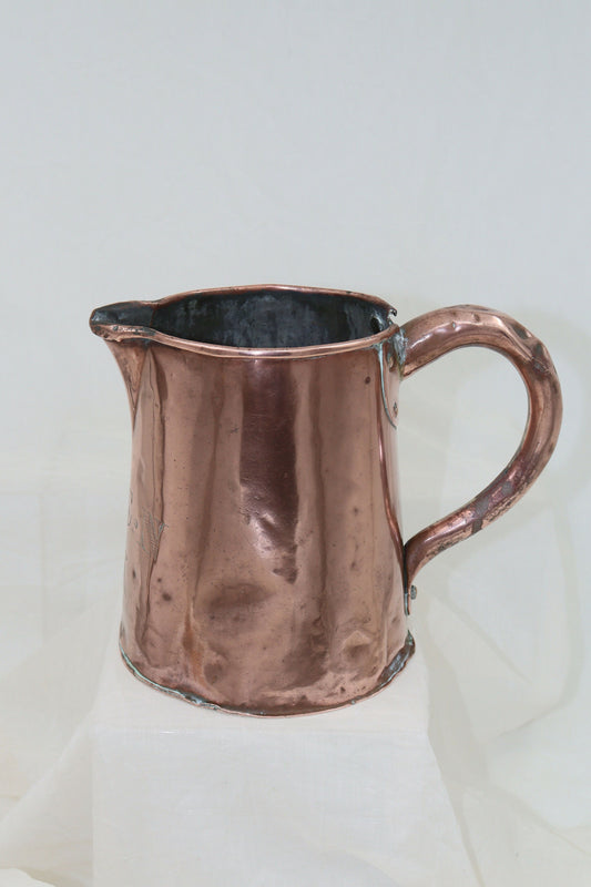 Antique copper jug