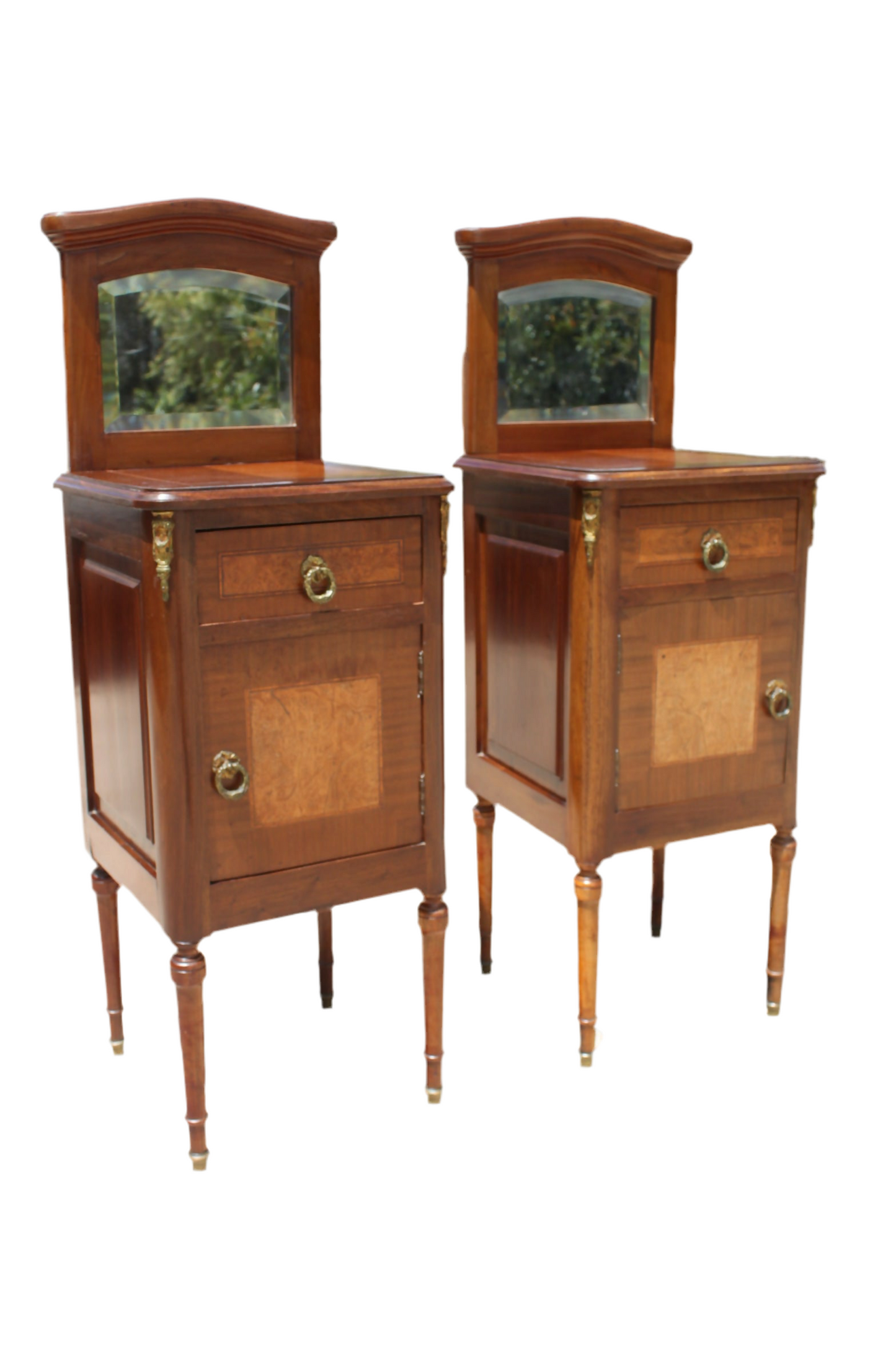 Pair of French inlaid bedside cabinets with mirrored backs