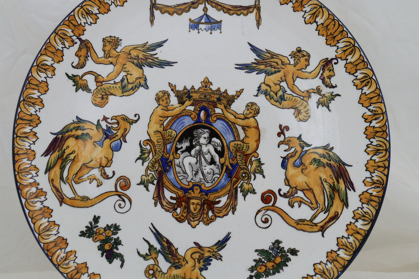 Hand painted wall charger by Gien of France