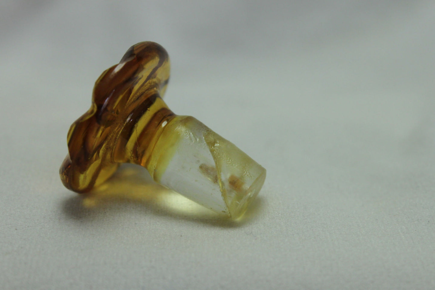 Engraved amber glass perfume bottle