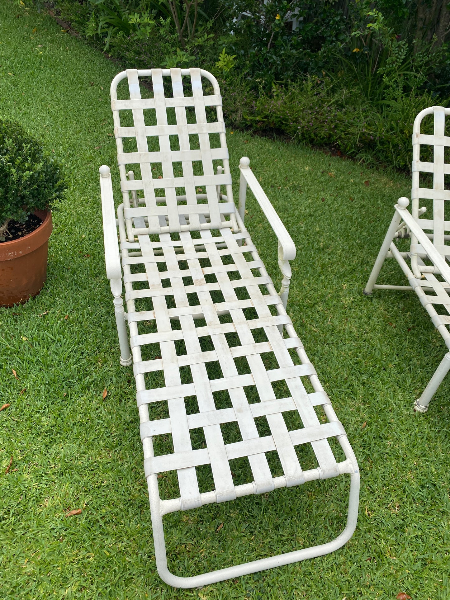 Pair vintage metal pool loungers