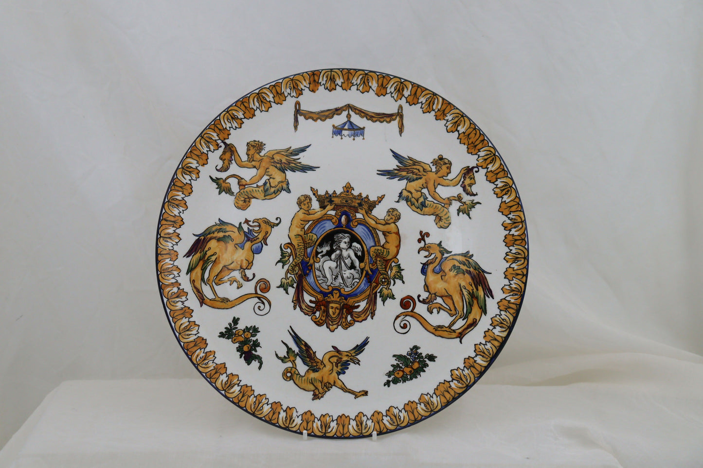 Hand painted wall charger by Gien of France