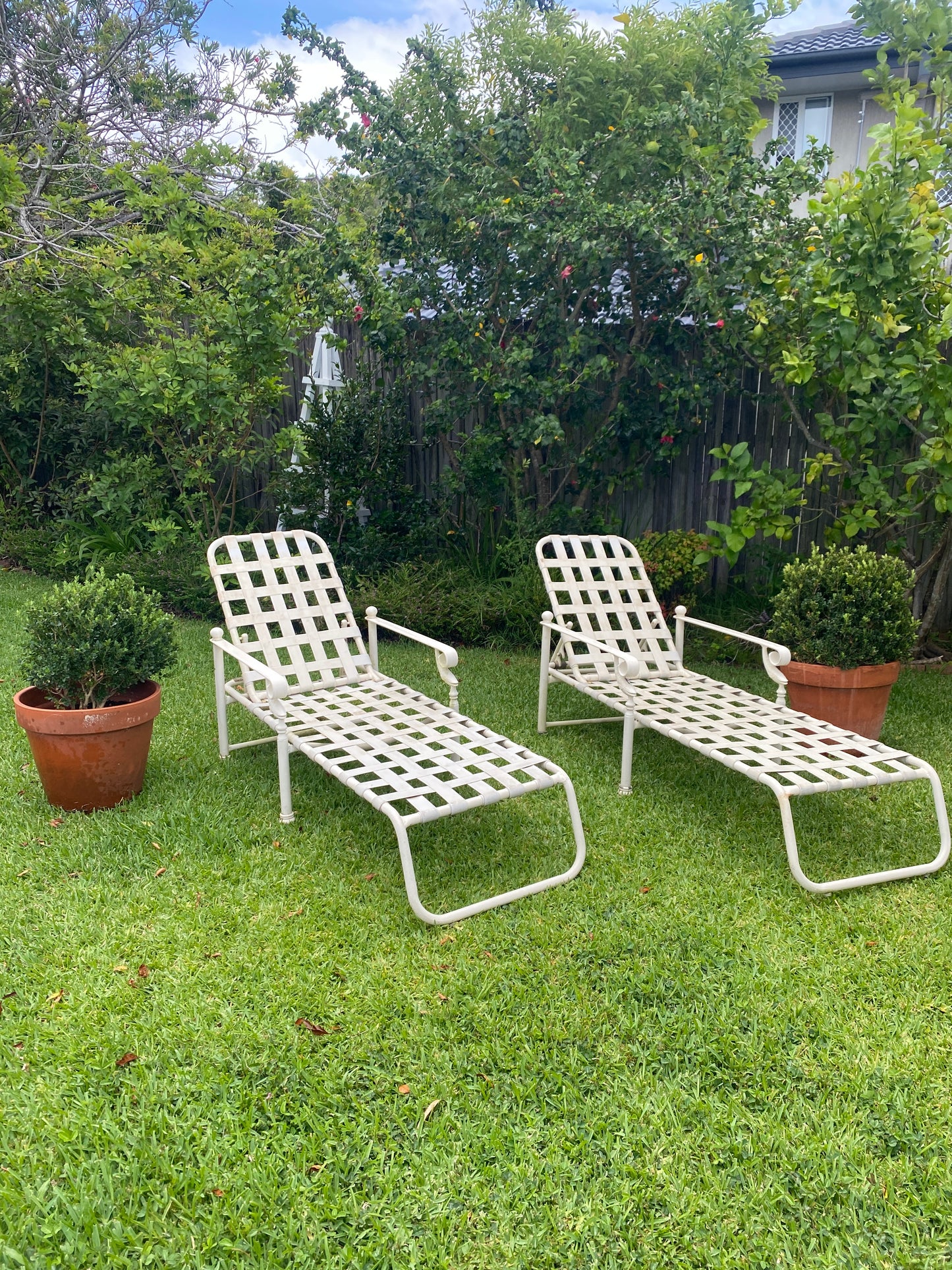 Pair vintage metal pool loungers