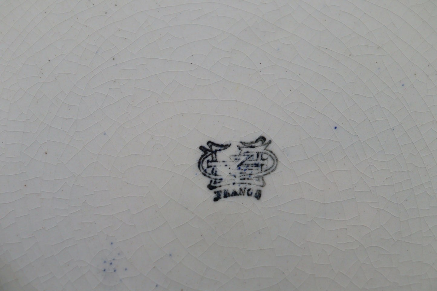 Hand painted wall charger by Gien of France