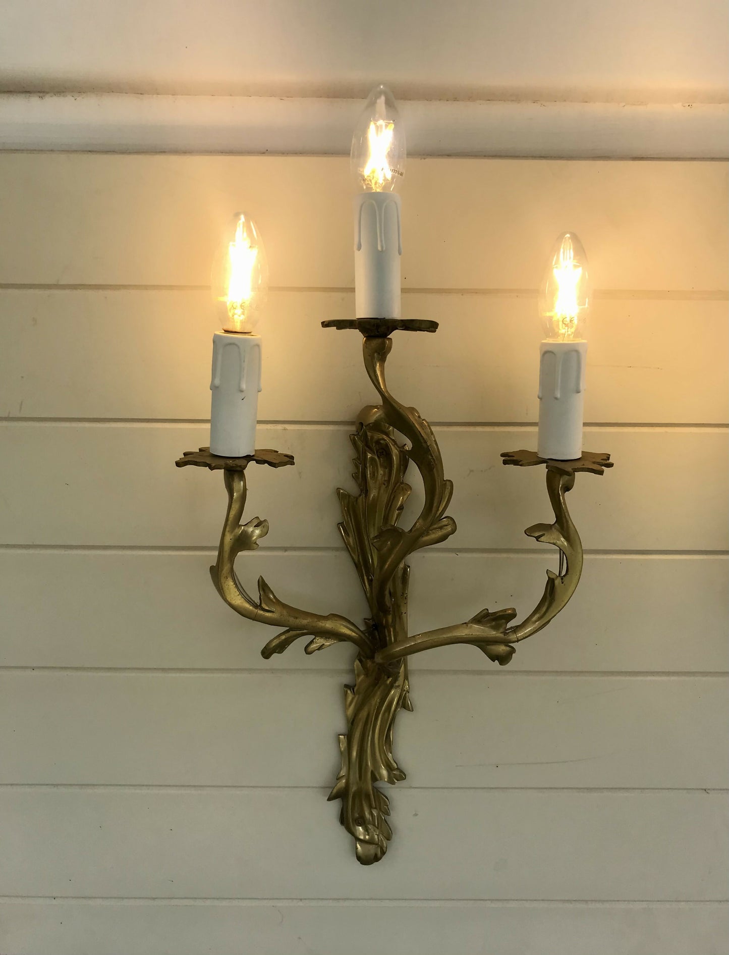 Pair of solid brass rococo wall sconces