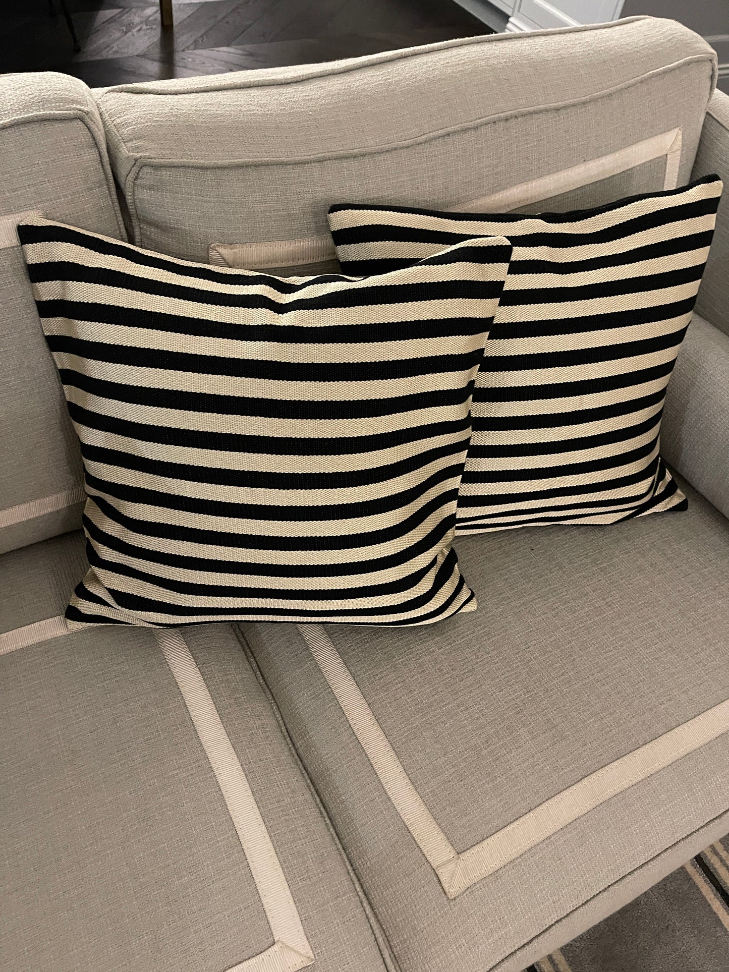 Striped cushions in Schumacher stripe