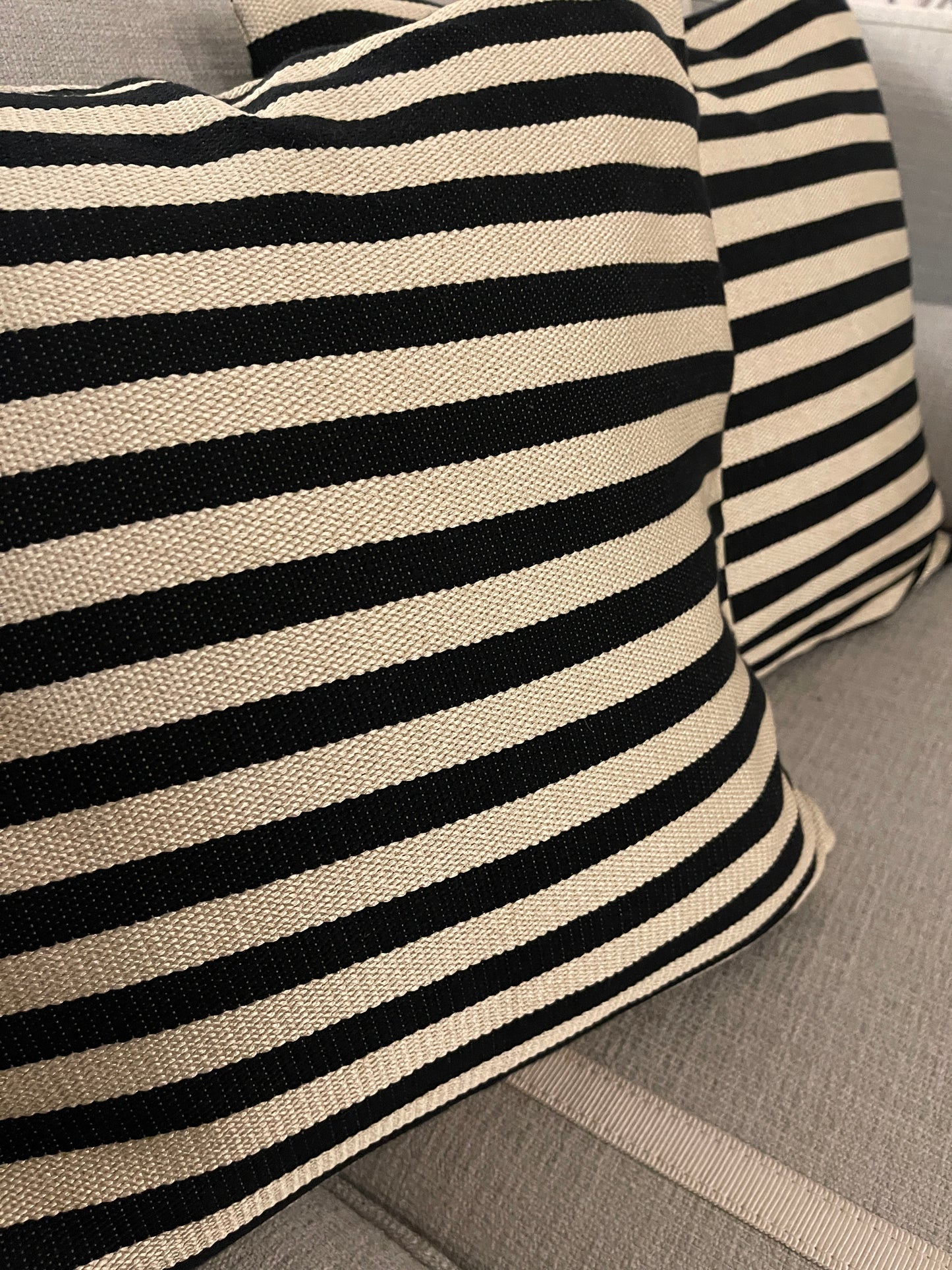 Striped cushions in Schumacher stripe