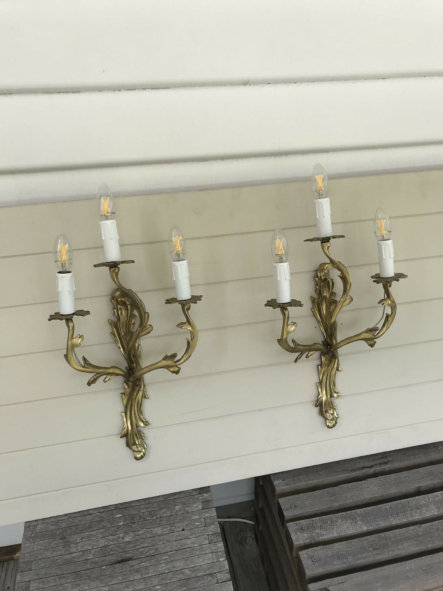 Pair of solid brass rococo wall sconces