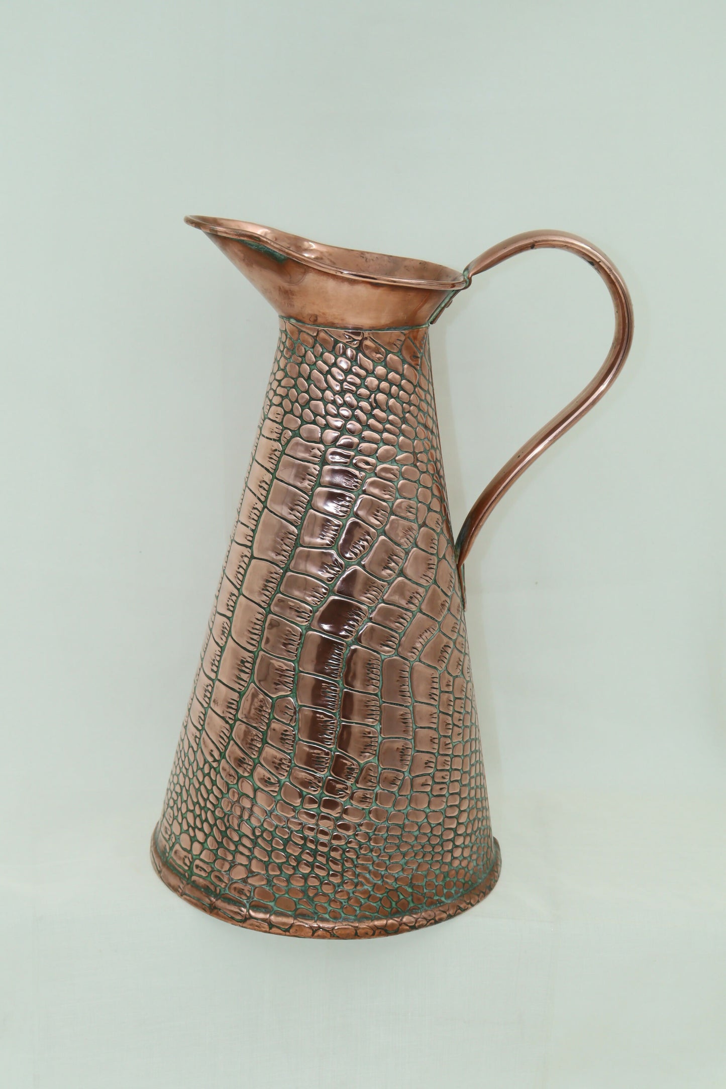 Copper crocodile skin jug by Sankey and Sons