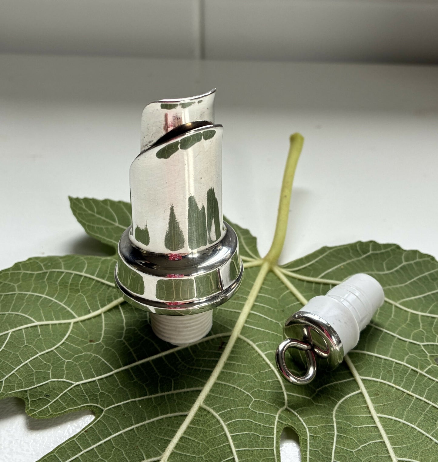 Silver wine pourer