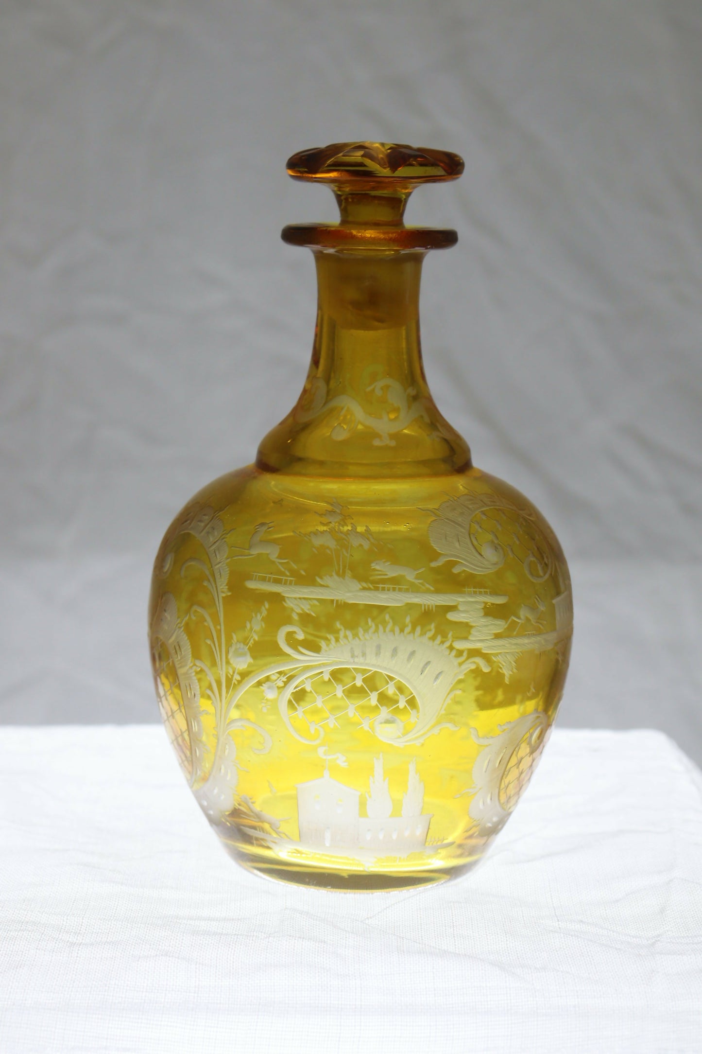 Engraved amber glass perfume bottle