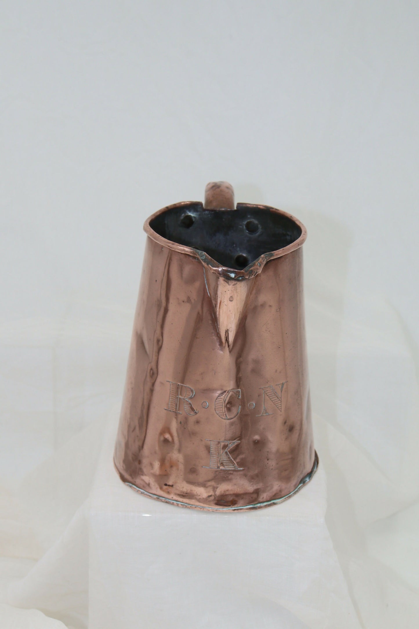 Antique copper jug