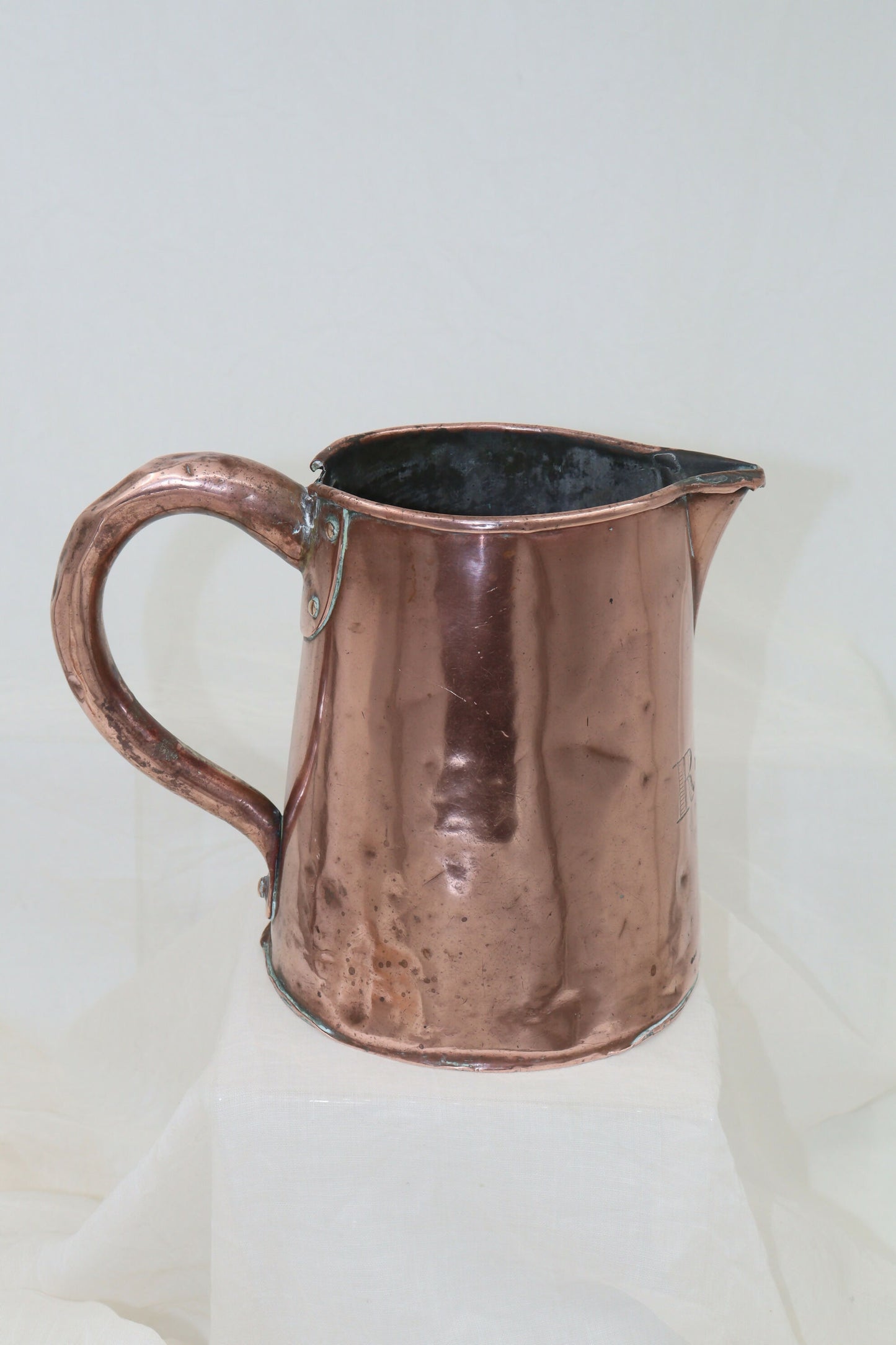 Antique copper jug