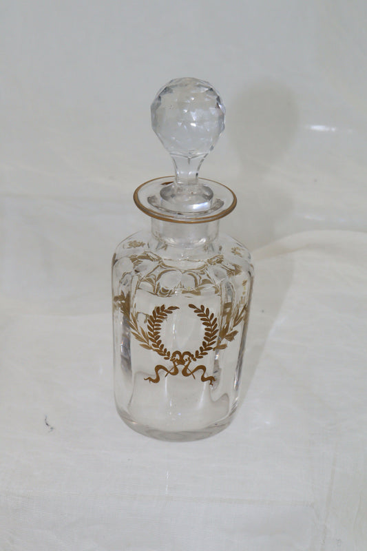 Glass perfume bottle with gilt laurel wreaths