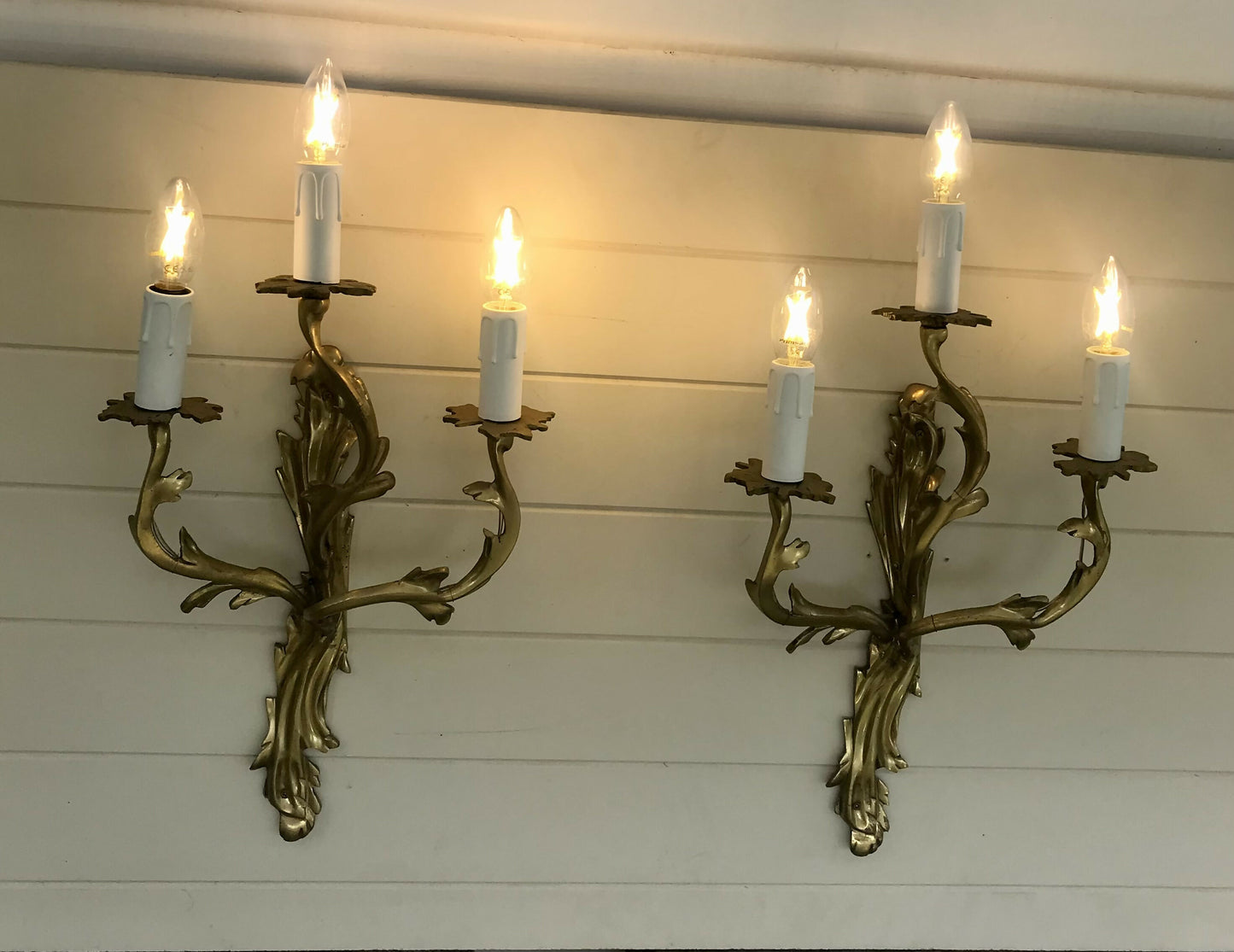 Pair of solid brass rococo wall sconces