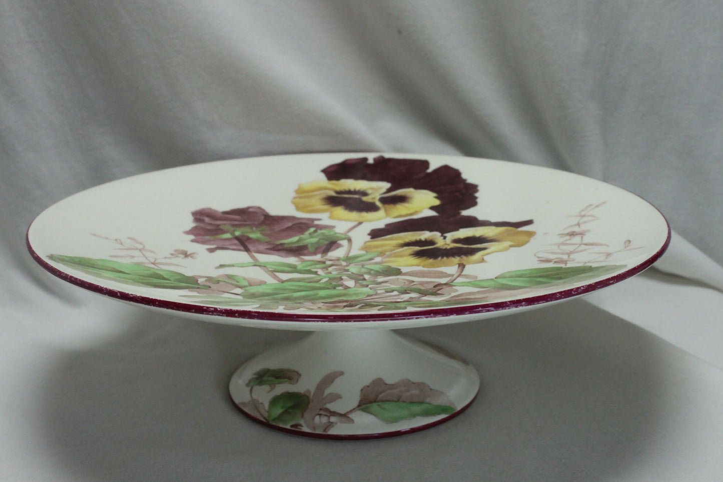 Brown-Westhead and Moore comport decorated with pansies and cyclamen