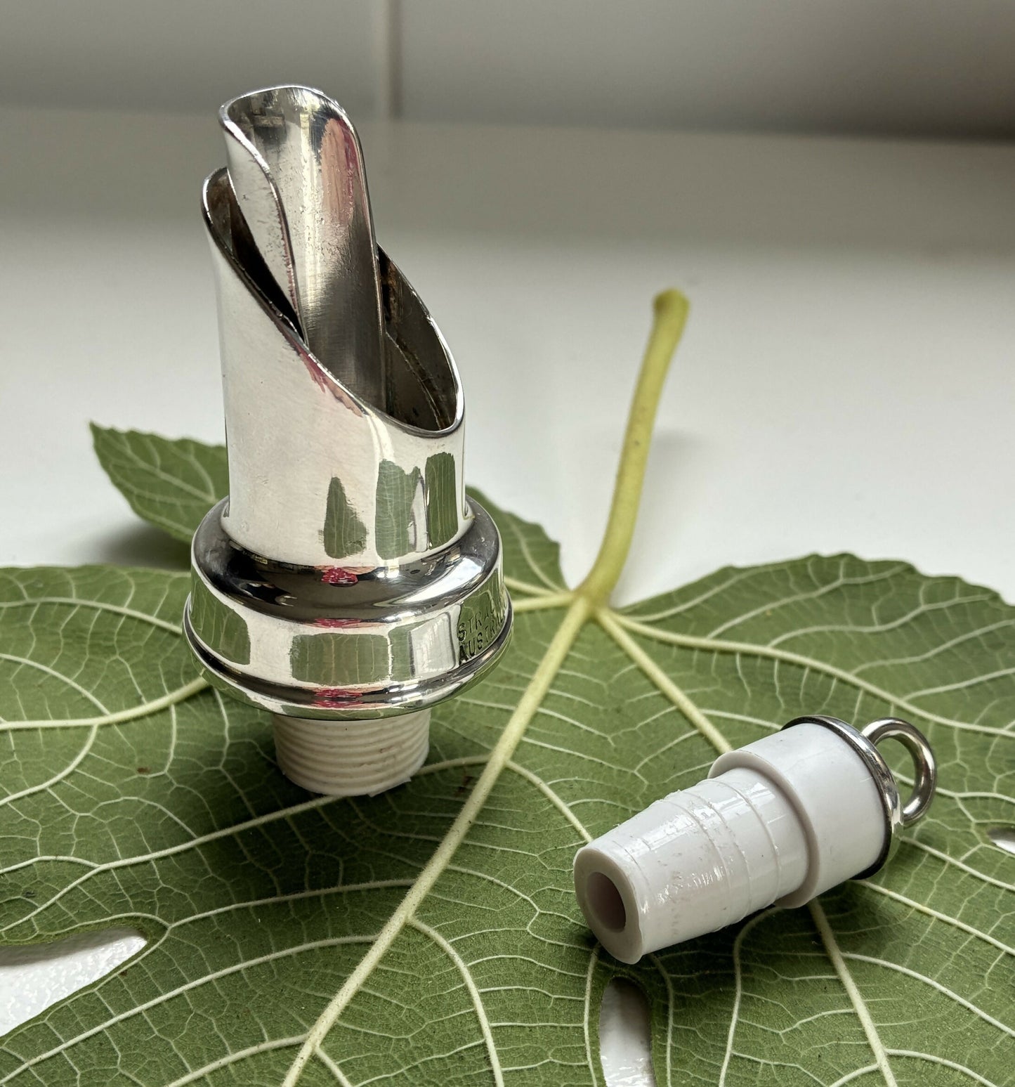 Silver wine pourer