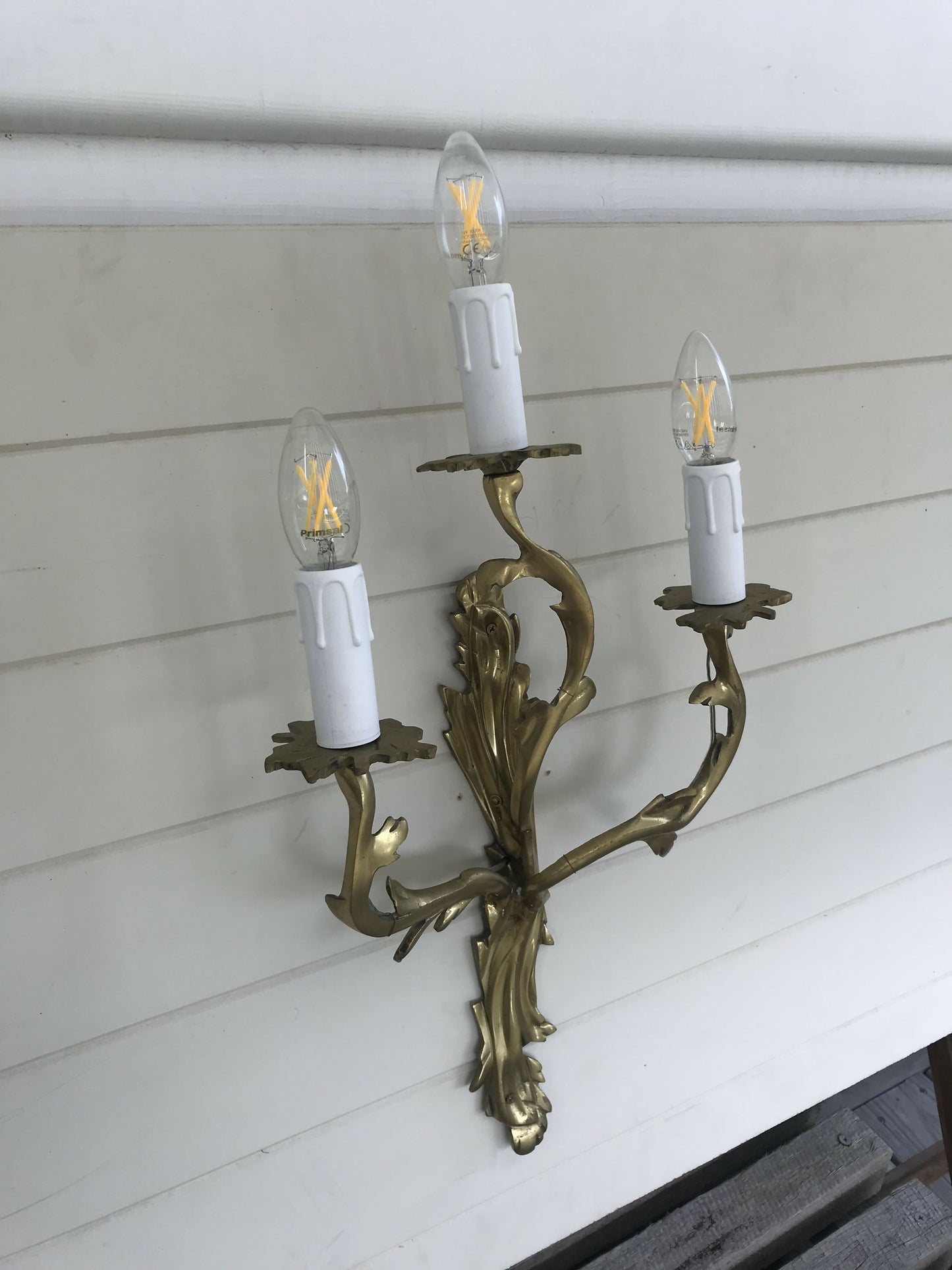 Pair of solid brass rococo wall sconces