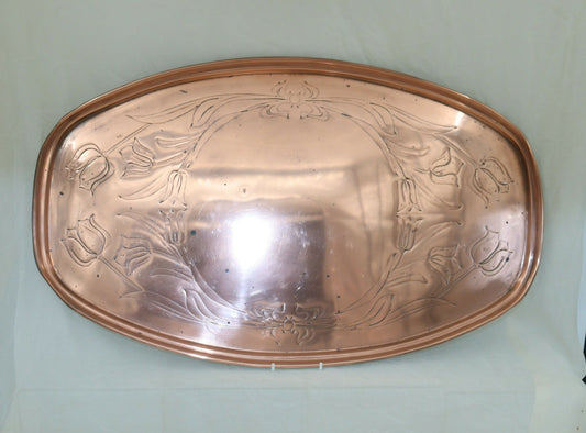 Large W A S Benson copper tray decorated with tulip pattern