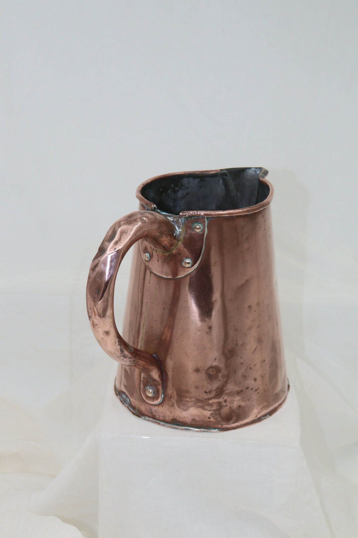 Antique copper jug